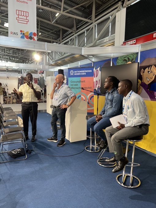 A talk at a conference booth