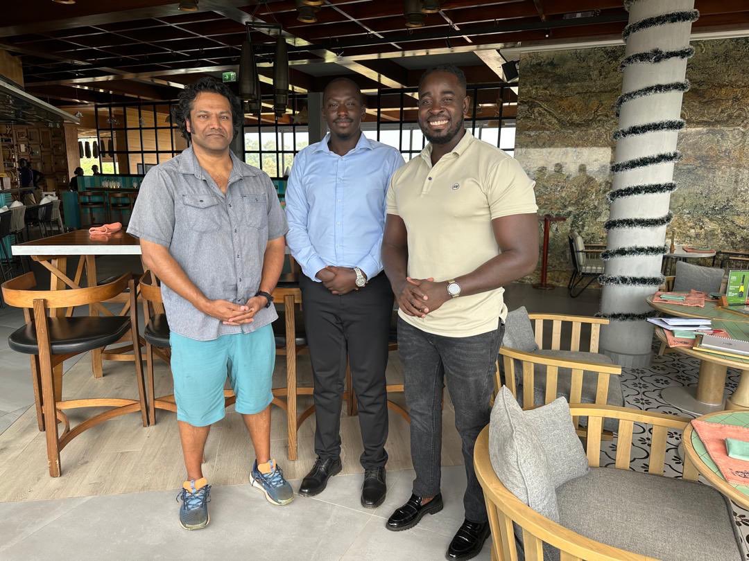 Three people in a restaurant seating area